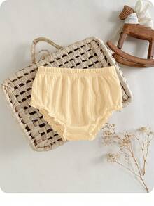 1 chiếc quần legging tam giác dễ thương cho bé gái, kiểu dáng đơn giản, chất liệu dệt kim, màu trơn, cạp chun. - Màu Mù tạt vàng - Xem 1