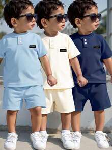 6 Stücke/Set Jungen lässig Sport College Street süße coole Buchstaben Patch T-Shirt + Shorts, geeignet für den täglichen Gebrauch, Schule, Ausflüge, Sport, Frühling/Sommer. Bietet mehrere Kombinationsmöglichkeiten für Kleinkinder Jungen, mit einfachem und elegantem Design, bequem und modisch. - Blau - Übersicht 1