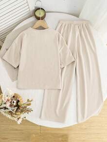 SHEIN 2 piezas Conjunto informal de camiseta de manga corta y pantalones de cuello redondo suelto y cómodo para niñas preadolescentes - Albaricoque - Ver 3