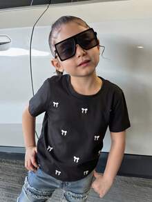 Dazy Kids Camiseta básica de manga corta para niñas (talla pequeña) con patrón de bordado de lazo - Negro - Ver 1