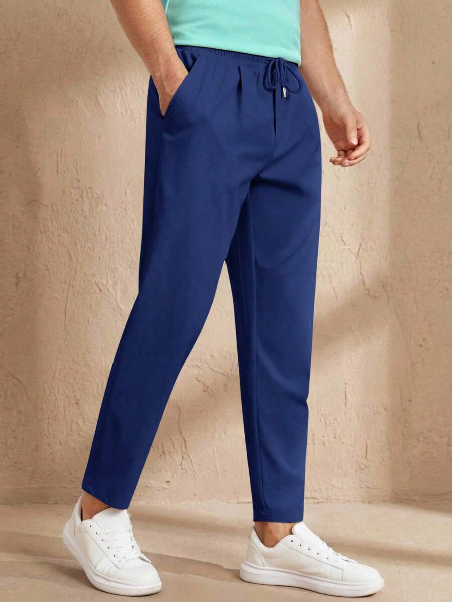 HIMLAND Pantalones casuales de hombre de unicolor con cordón en la cintura, ajuste delgado, adecuados para el uso diario - Azul - Ver 1