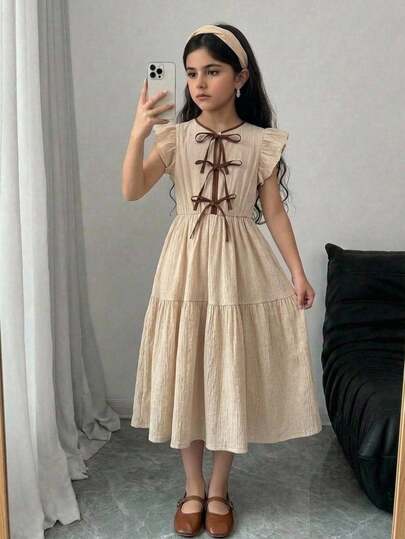 SHEIN Vestido de largo medio con decoración de lazo de color contrastante y dobladillo con volantes para niña preadolescente, estilo casual escolar y de calle