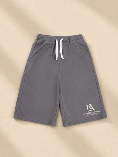 SUMWON Pantalones cortos de punto de gofre con cordón, cintura elástica con detalle de logo, cómodos y casuales para el verano, de longitud hasta la rodilla, ajuste regular, con bolsillos laterales, relajados