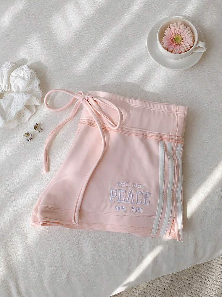 Flirla Quần short nữ dáng ôm, màu hồng nhạt, họa tiết tối giản, có dây rút ở eo, thích hợp cho hoạt động thể thao. - Hồng - Xem 5