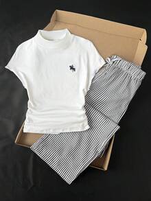 SHEIN 青少年女孩春夏新款時尚休閒極簡白色印花T恤與黑白條紋長褲針織兩件套，居家、外出、上學、度假皆適用，百搭青少年女孩 - 黑與白 - 查看 6