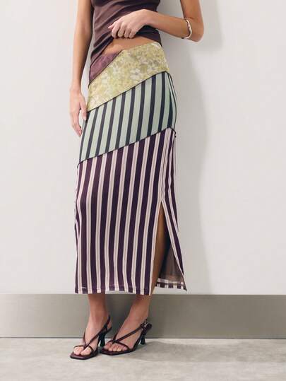 Nöista Patchwork Midi Skirt Features A High-Waisted, H-Line Silhouette With A Unique Visual Impact From The Diagonal Patchwork Design. Comfortable To Wear, Its Classic Retro Color Is Highly Recognizable. Suitable For Everyday Casual Wear, Commuting, And Vacations, It's An Indispensable Eye-Catching Piece In The Urban Woman's Wardrobe.