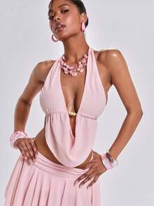 ROMWE Bộ đồ 2 mảnh phong cách Y2K gợi cảm gồm áo crop top hở lưng và chân váy mini xếp ly không đều, thích hợp cho kỳ nghỉ, đi biển, hẹn hò, lễ hội âm nhạc, tiệc tùng và mặc hàng ngày. - Hồng - Xem 9