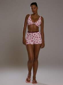 Musera Sport Bộ đồ thể thao gồm áo bra thể thao cổ yếm xoắn họa tiết quả anh đào và quần short phối màu tương phản, thích hợp cho tập luyện thể dục, tập gym, pilates, thể hình, mặc hàng ngày, phong cách thường ngày, điểm nhấn là họa tiết quả anh đào. - Nhiều màu - Xem 5