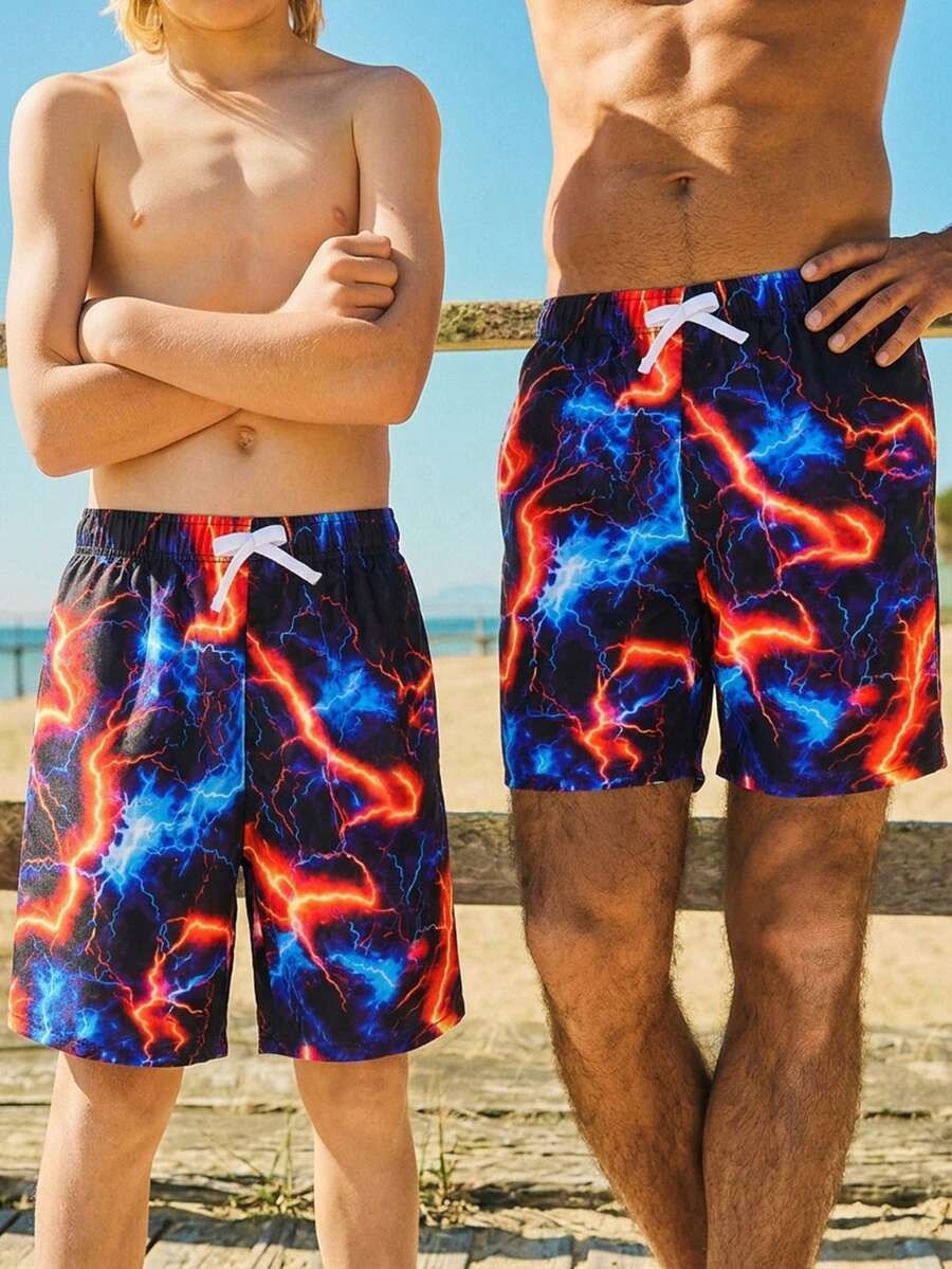 SHEIN 青少年男童休闲荧光图案宽松泳衣，适合夏季海滩度假和泳池派对