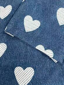 Resyla Áo sơ mi denim in hình trái tim dành cho nữ, kiểu dáng rộng rãi, tay ngắn, cài cúc, phong cách preppy, hàng mới về năm 2026, thích hợp mặc hàng ngày và đi nghỉ mát. - Nhiều màu - Xem 3