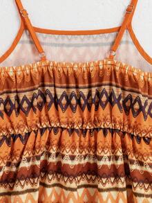 SHEIN Sparklyn Đầm không tay màu cam trơn cho bé gái tuổi teen, viền bèo nhún, họa tiết hình học cổ điển. Cả hai chiếc đầm đều phù hợp cho bé gái, chiếc đầu tiên có màu cam trơn sạch sẽ với viền bèo nhún mềm mại, còn chiếc thứ hai có họa tiết hình học cổ điển nhiều lớp màu cam, nâu, be và đen, mang hơi hướng cổ điển, hoàn hảo cho mùa xuân. - Màu Cam cháy - Xem 5