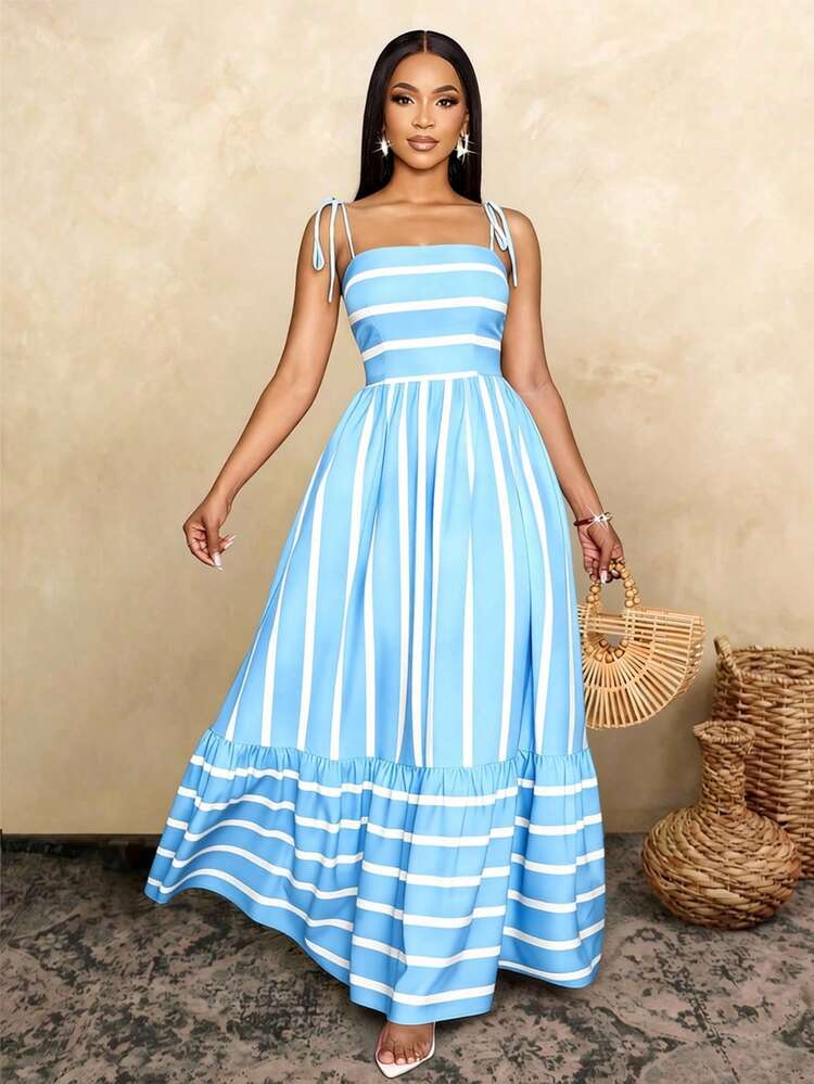 striped blue and white maxi dress Harbor Heat - Off Navy, Large | Hazel and Olive wearing a size S.Style Baltic Born Womens Ramos Tiered