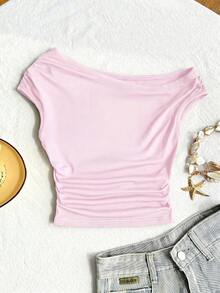 Áo kiểu lệch vai màu hồng cho bé gái tuổi teen, dáng crop top một vai (trang trí sao biển vàng), chất vải mềm mại thoải mái, thiết kế vai độc đáo + trang trí tinh tế, phù hợp cho các dịp thường nhật/sự kiện, không bó sát, dễ phối đồ, tạo nên vẻ ngoài cá tính và sành điệu cho bé gái. - Hồng - Xem 5
