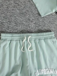 SHEIN 儿童青少年女孩两件套绿色针织休闲宽松美式英语标语印花圆领短袖T恤和印花短裤，适合夏季街头运动。 - 薄荷綠 - 查看 4