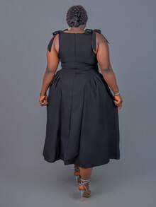 CurvyTilda Plus Size Crew Neck Sleeveless Bow Decor Waist Flare Hem Black Casual Christmas Dress, For Hourglass Body Shape - Black - View 6