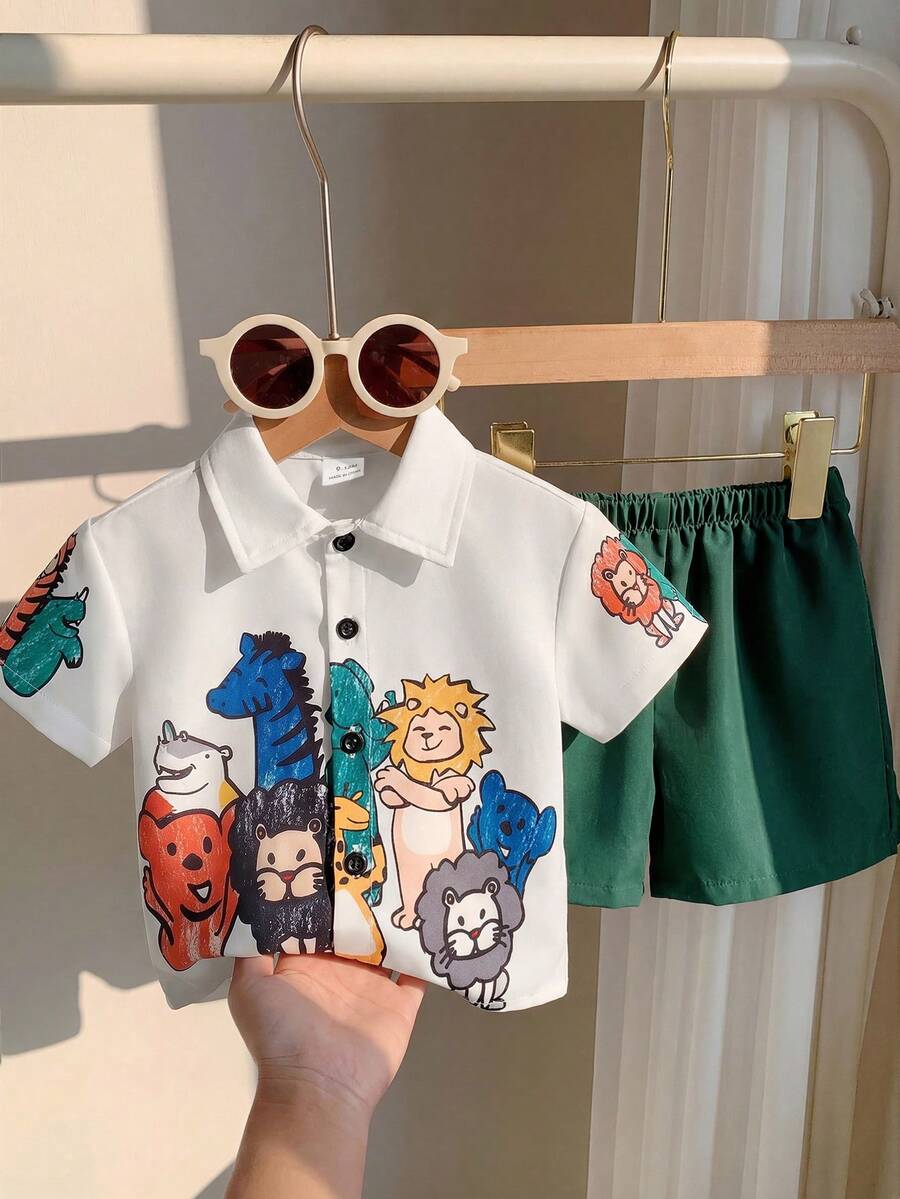 SHEIN Set de 2 piezas de camisa de manga corta con estampado de letras y pantalones cortos de cintura elástica, estilo casual y chic para niño/niña, adecuado para primavera/verano, apto para juegos al aire libre