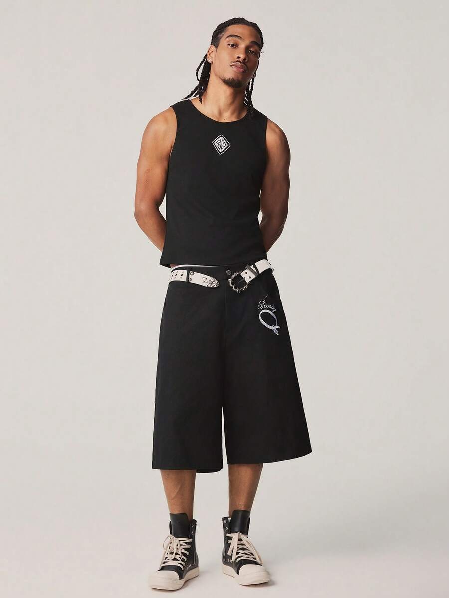 SCOOBY-DOO X SHEIN Conjunto casual de camiseta de tirantes con estampado geométrico y pantalones cortos capri para hombre - DOO - Negro - Ver 1