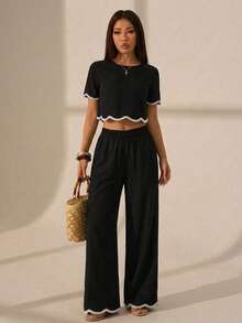 SHEIN PETITE Bộ đồ nữ 2 mảnh gồm áo ngắn tay cổ tròn phối màu tương phản và quần dài, bộ đồ thời trang đi nghỉ mát, áo ngắn tay viền ren phối màu tương phản và quần dài, phù hợp mọi mùa, bộ đồ màu đen cho nữ, bộ đồ không tay và quần dài 2 mảnh, quần áo nữ mùa thu, trang phục công sở thường ngày cho nữ, bộ đồ quần ống rộng 2 mảnh cho nữ, áo viền ren lượn sóng màu đen thường ngày mùa hè, trang phục nghỉ lễ kiểu Pháp mùa hè, bộ đồ mùa xuân, trang phục mùa xuân cho nữ, bộ đồ ngày Valentine, bộ đồ năm mới, bộ quần ống rộng hai mảnh tay ngắn cho nữ - màu đen - Xem 3