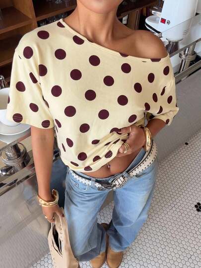 Muchica Summer Brown Polka Dot Asymmetric Off Shoulder Top For Women, Back To School Outfit, Street Style Casual T Shirt, American Casual Vacation And Festival Wear, Short Sleeve Cute Party Top, Stylish Going Out Beach Blouse, Loose Fit Soft Comfortable Everyday Look
