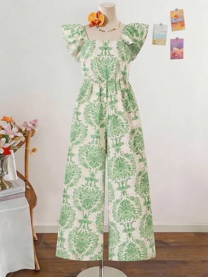 SHEIN 这款柔和的米色连体裤饰以鲜艳的红橙色花朵和绿色叶子图案，宛如一座生机勃勃的春日花园。方形领口凸显肩颈线条，飘逸的袖子和阔腿裤型则营造出轻松又不失吸睛的造型。无论是海滩度假、花园下午茶，还是漫步于充满艺术气息的市集，这款连体裤都能让你散发出无忧无虑的假日气息。