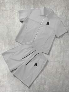 Manfinity Hypemode Camisa de manga corta con cremallera y estampado de letras, y pantalones cortos, conjunto casual diario para hombres - Gris Claro - Ver 1