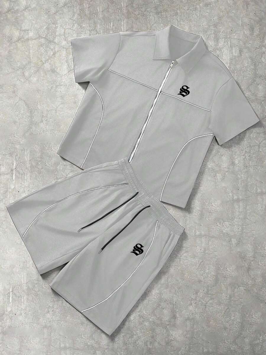 Manfinity Hypemode Camisa de manga corta con cremallera y estampado de letras, y pantalones cortos, conjunto casual diario para hombres - Gris Claro - Ver 1