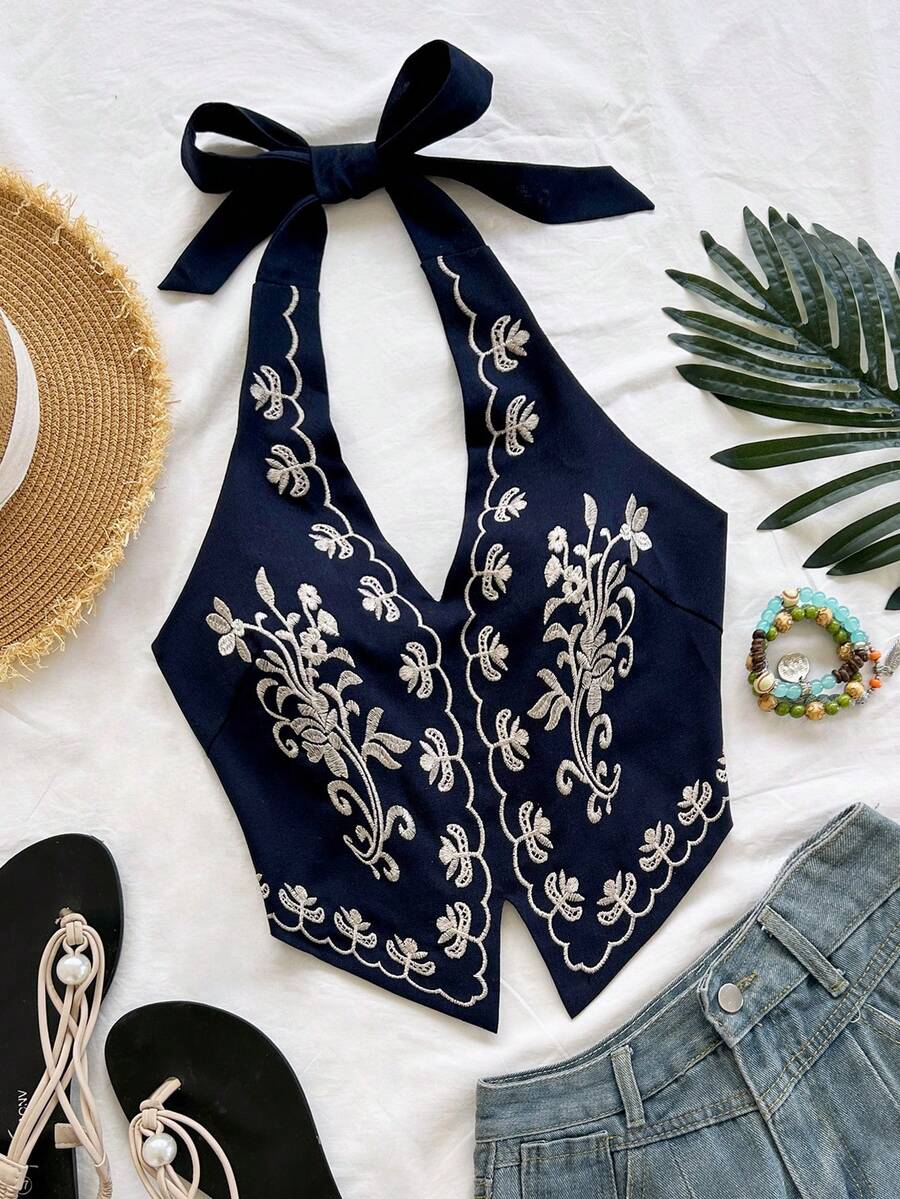 Soleia Top corto con cuello de halter, bordado de flores negras sobre base de color albaricoque, con lazo, adecuado para festivales de música - Azul Marino - Ver 1