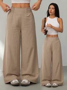 SHEIN PETITE Bộ sưu tập Xuân/Hè 2026 mới, kiểu dáng thường ngày, thích hợp cho các buổi đi chơi, dự tiệc, đi làm, đi học, hẹn hò, ở nhà, tiệc sinh nhật và nhiều dịp khác. Quần ống rộng, cạp chun, màu be, phù hợp cho nhiều hoạt động. - Màu Khaki - Xem 1