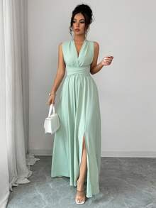 Elenzga Đầm maxi không tay màu xanh lá cây mềm mại dành cho nữ, cổ chữ V đan chéo, thắt nơ sau eo, xẻ tà điều chỉnh được, đa năng, thanh lịch, tôn dáng, phong cách Pháp lãng mạn cổ điển, thích hợp cho công sở, đi làm, đi biển, nghỉ lễ, dạo phố, đơn giản, đa năng, phù hợp cho đám cưới, phù dâu, ngày Valentine, tiệc trà chiều, mùa xuân hè. - Màu xanh Bạc hà - Xem 5