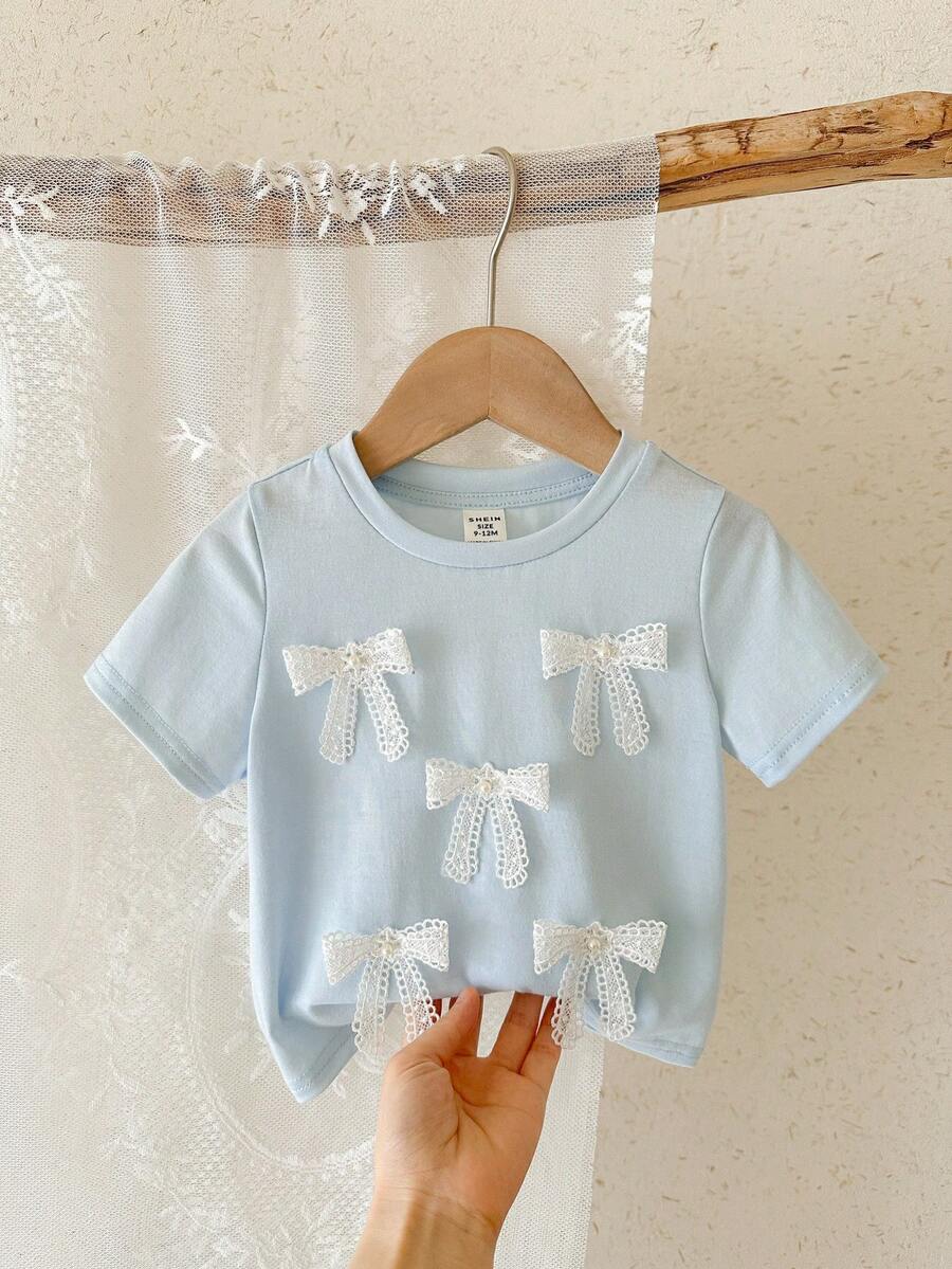 SHEIN LMoss Kids Áo thun bé gái dễ thương với nơ 3D, kiểu dáng thường ngày, đa năng, phù hợp cho mọi dịp. - Màu xanh nhạt - Xem 1