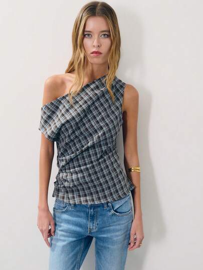 Nöista Asymmetrical Off-The-Shoulder Plaid Top Is Made Of Breathable And Comfortable Fabric. A Highlight For Summer And Early Autumn, It Offers A Casual Yet Individualistic Style. The Retro Plaid Pattern Is A Classic Element, Easily Creating Fashionable Casual Or Urban Looks. It Pairs Effortlessly With Basic Jeans And Skirts.