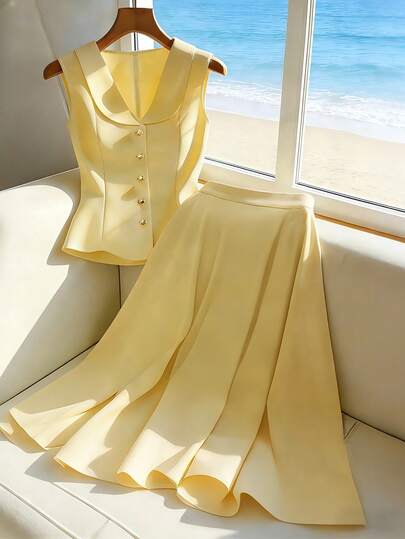 SHEIN Franclia 新款优雅修身无袖黄色夏季两件套，是女士衬衫外套的理想之选。这款奶油黄色中长裙两件套优雅迷人，适合女性职业装和办公室穿着。这款优雅的女士套装经典百搭，可作为正式服装穿着。女装，女士职业套装