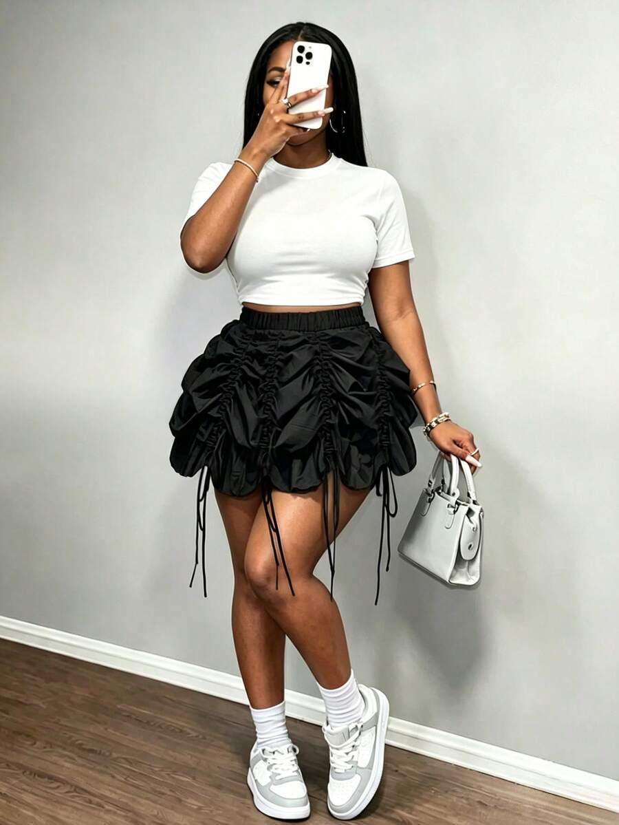 BamGleam Minifalda plisada con cordón negro, falda de cintura alta con efecto globo, estilo dulce y sexy para el verano - Negro - Ver 1