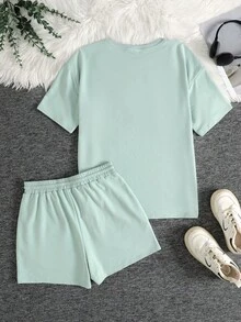 SHEIN 儿童青少年女孩两件套绿色针织休闲宽松美式英语标语印花圆领短袖T恤和印花短裤，适合夏季街头运动。 - 薄荷綠 - 查看 2