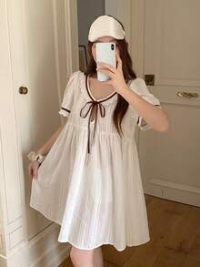 Livesso Áo ngủ nữ tay ngắn dáng rộng buộc dây phía trước - trắng - Xem 13