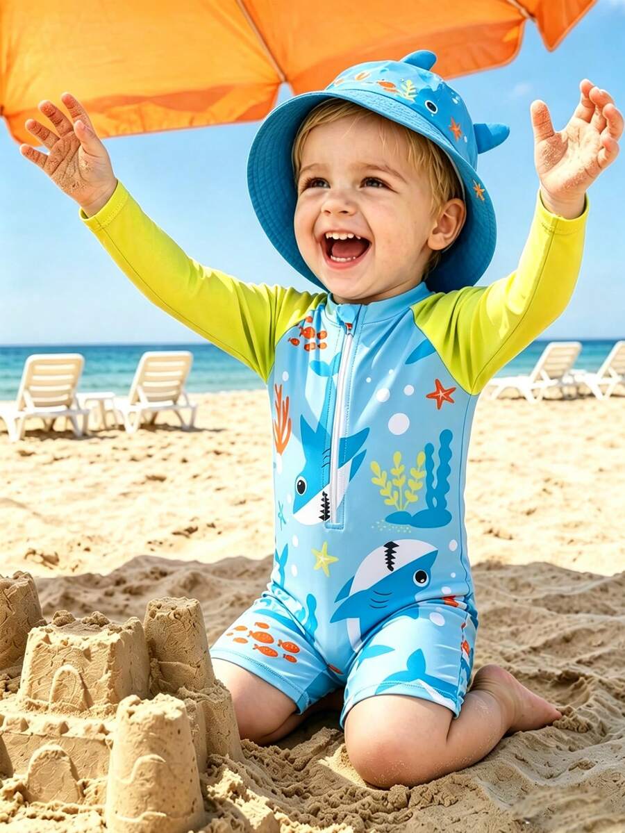 婴儿拉链泳衣,海洋生物鲨鱼印花。夏季海滩度假必备时尚单品。长袖设计,蓝色撞色,可爱的鲨鱼和海洋生物卡通图案。生动活泼。适合可爱的男宝宝在海滩玩耍时穿着。 - 藍色 - 查看 1