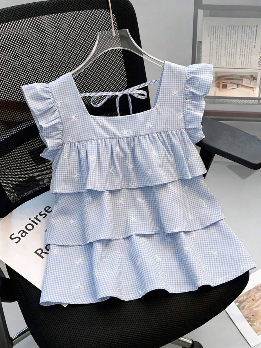 SHEIN Franclia Áo kiểu nữ mùa hè 2026 mới, màu xanh kẻ caro, họa tiết nơ, xếp tầng, cổ vuông, tay bồng, thắt nơ sau, kiểu peplum, áo crop top dễ thương phong cách Y2K cho kỳ nghỉ và mặc thường ngày. - Nhiều màu - Xem 1