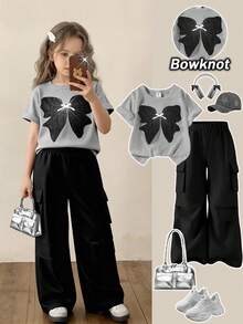 SHEIN Elladie kids Bộ 2 món cho bé gái: Áo thun dệt kim tay ngắn màu trắng và quần cargo dệt kim đính nơ màu xanh dương, trang phục mùa hè thời trang. - Xám - Xem 1