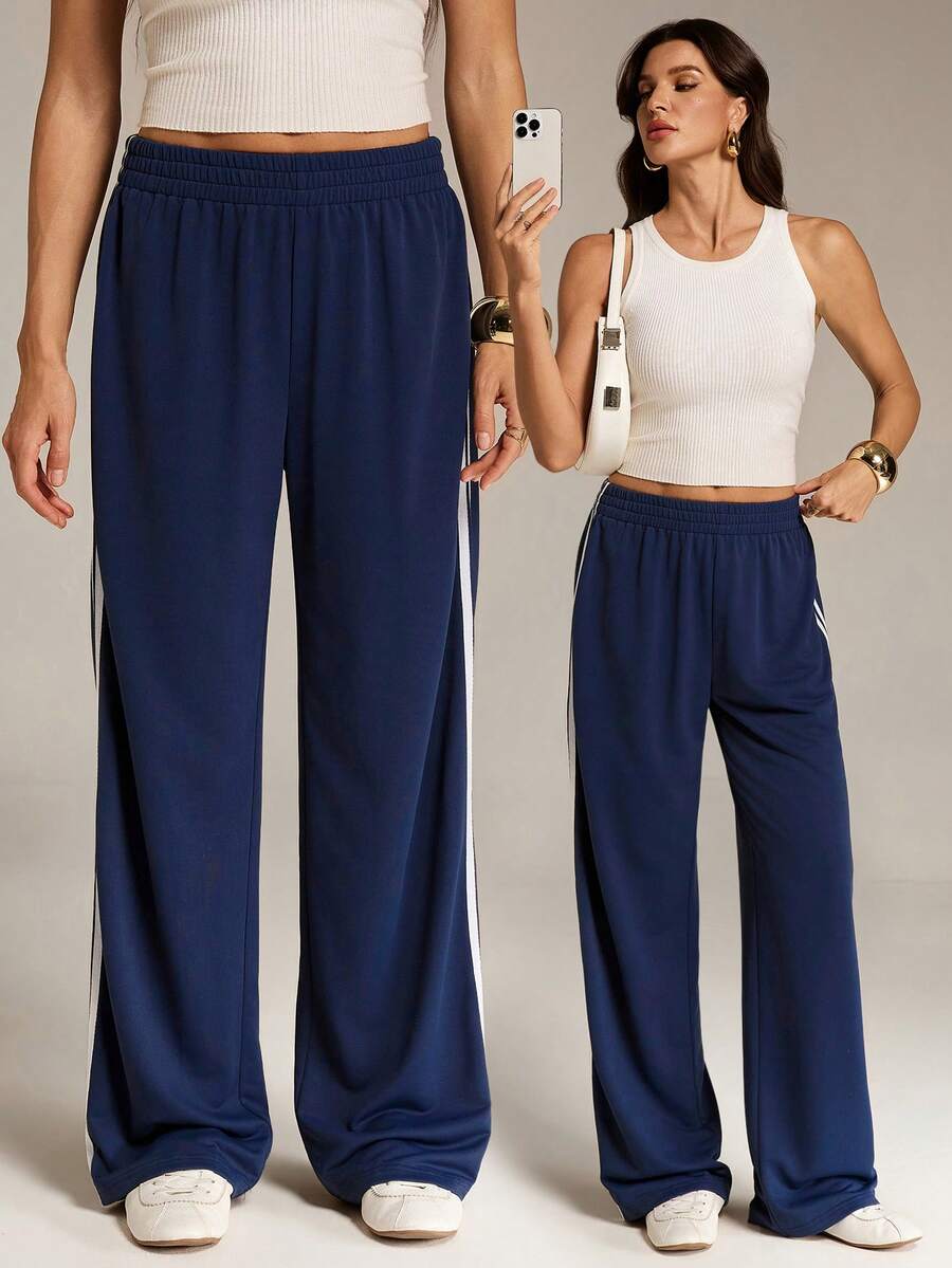 SHEIN Tall Quần nỉ màu xanh hải quân dáng rộng với họa tiết sọc bên hông, tạo nên vẻ ngoài thoải mái hàng ngày. - Màu xanh hải quân - Xem 1