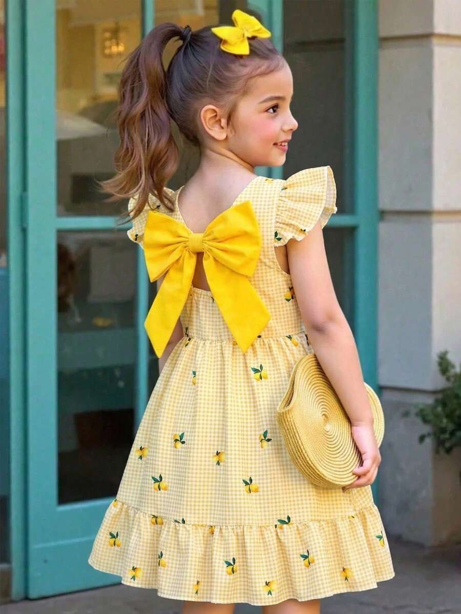 SHEIN Girls' Lemon Print Dress,Summer Fairy White Plaid Holiday,Flutter Sleeve,Ruffle Hem,Back Bow Cutout,Casual & Matching For Family Vacation,Fresh Cute - Yellow - View 1
