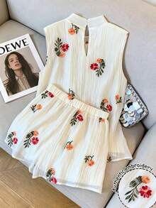 GlowEve Conjunto de 2 piezas de blusa sin mangas con volantes y lazo bordado en color albaricoque y shorts, conjunto de vacaciones para mujer - Albaricoque - Ver 2