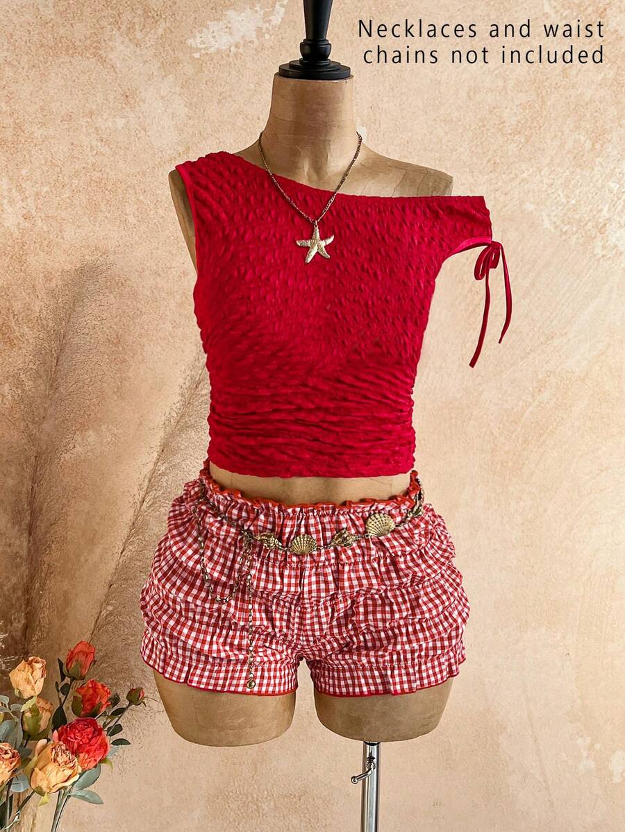 SHEIN Bộ đồ thường ngày cho bé gái tuổi teen mùa xuân/hè gồm áo croptop bất đối xứng màu đỏ có họa tiết và quần short kẻ caro dáng rộng màu cam, thích hợp cho kỳ nghỉ. - Đỏ - Xem 1