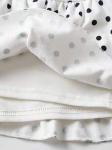 SHEIN Chân váy xếp ly họa tiết chấm bi thanh lịch, kiểu dáng thường ngày cho bé gái (có quần short bên trong), màu trắng, dáng chữ A. - trắng - Xem 8