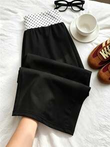Quần dài ống đứng màu đen cho bé gái, kiểu dáng thường ngày, phối họa tiết chấm bi đen trắng, cạp quần rộng. - Đen và trắng - Xem 4