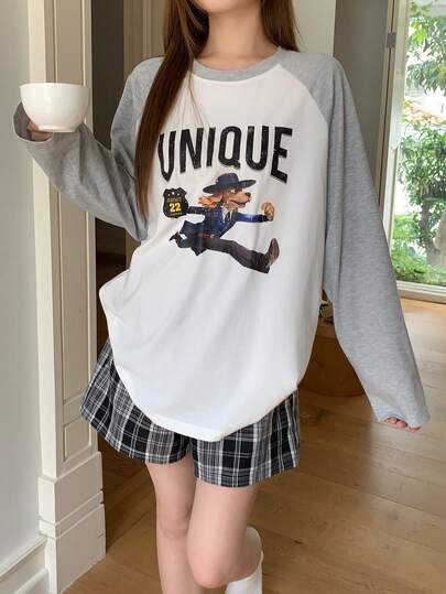 Livesso Conjunto de pijama de top de manga raglán con contraste de color y patrón de letras y dibujos animados, y shorts para mujer