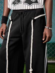 EVRINFINITE Quần jogger nam màu đen có sọc bên hông, dáng rộng, dây rút, kiểu dáng thường ngày, có tua rua. - màu đen - Xem 5