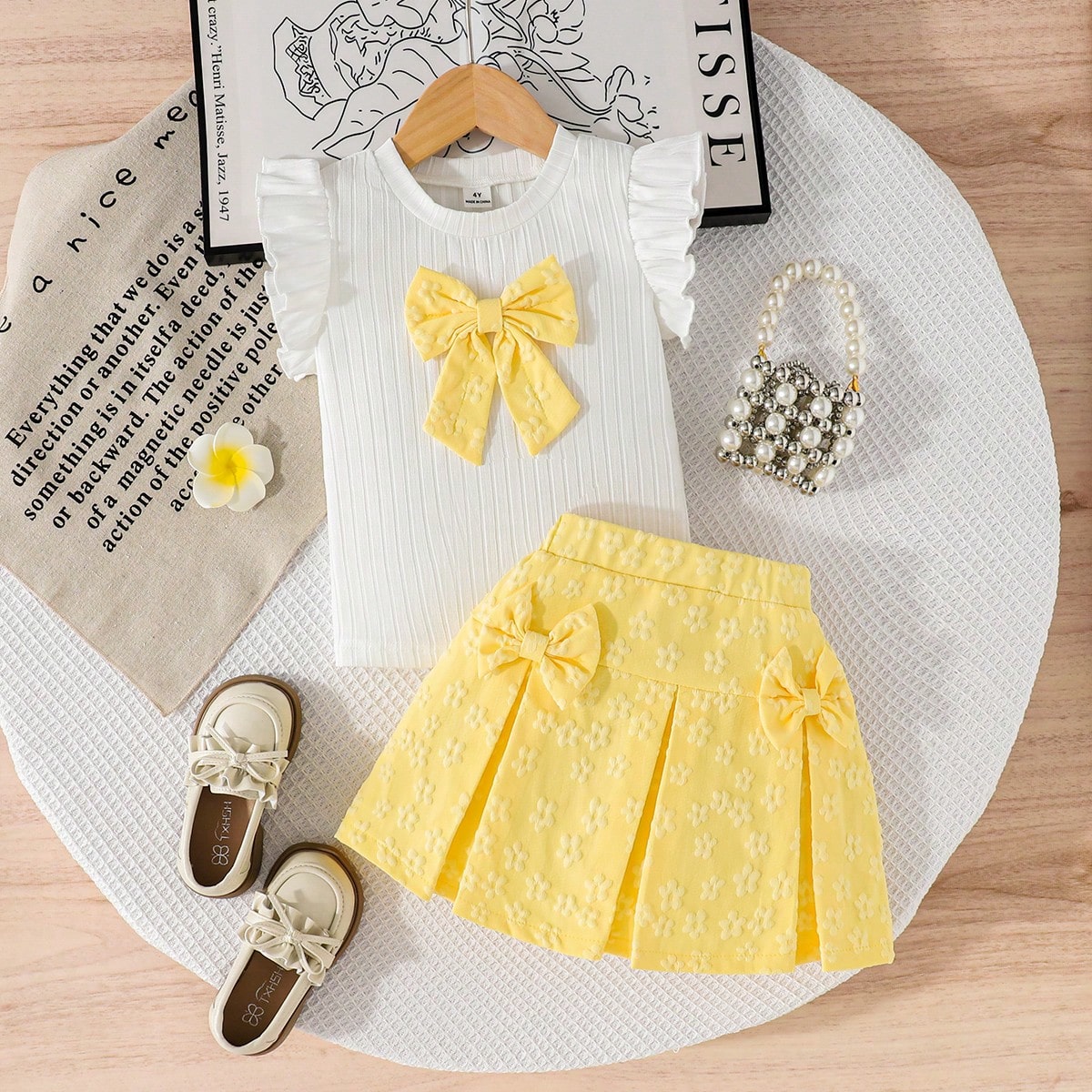 Top sin mangas con acento de lazo 3D para niñas jóvenes, combinada con falda con estampado floral 3D amarillo, decorada con lazo en la cintura, adec