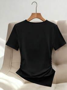 Formidée Plus Size Women's Minimalist Elegant Asymmetric Short Sleeve T-Shirt, Black And Gold Metal Accent, Asymmetric Hem Side Ruched, Summer Work Top - Black - View 2
