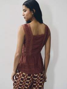 Nöista Sleeveless Top In Rust Brown With A Flattering Square Neckline And Ruffled Shoulder Straps.Smked Bodice Peplum Hem.Perfect For Dinners, Events, Chic - Brown - View 2