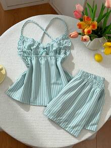 Sweetra Bộ đồ sọc xanh phong cách nghỉ mát biển Mỹ gợi cảm, áo yếm chéo cổ kết hợp với quần short ống đứng ôm sát, tạo nên vẻ ngoài sành điệu mùa hè. - Màu xanh lam - Xem 3